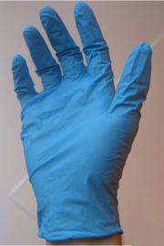 A blue disposable nitrile glove, as worn for medical examination